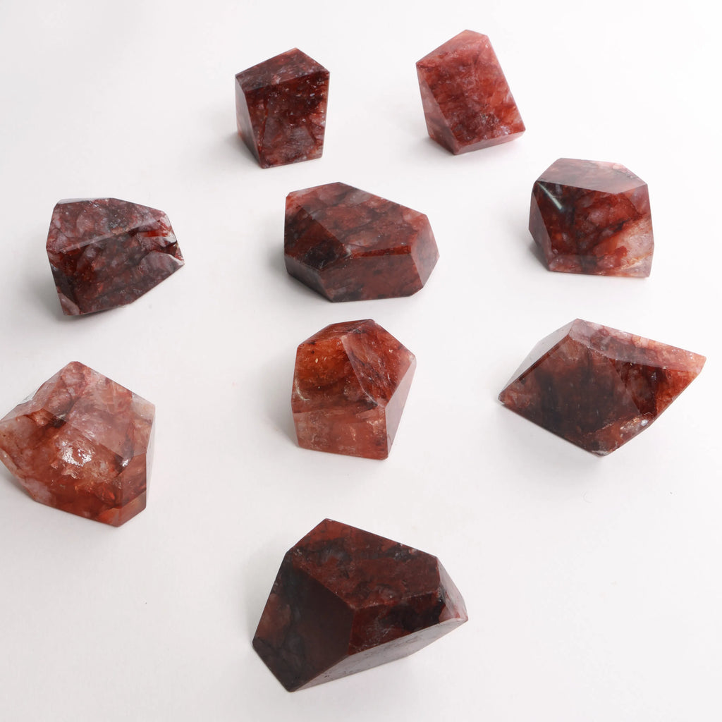 Polished Fire Quartz Crystals — Towers & Freeforms