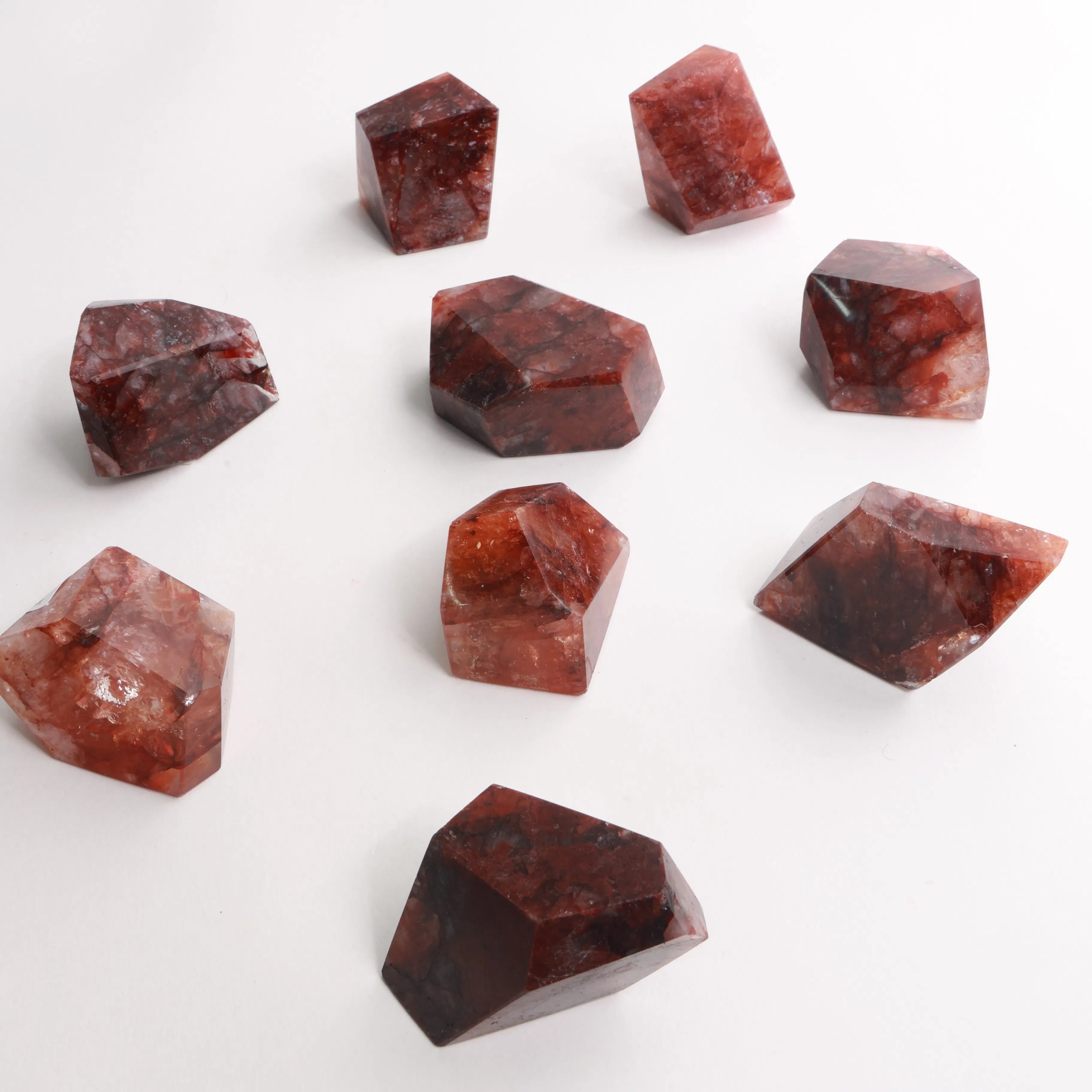 Polished Fire Quartz Crystals — Towers & Freeforms